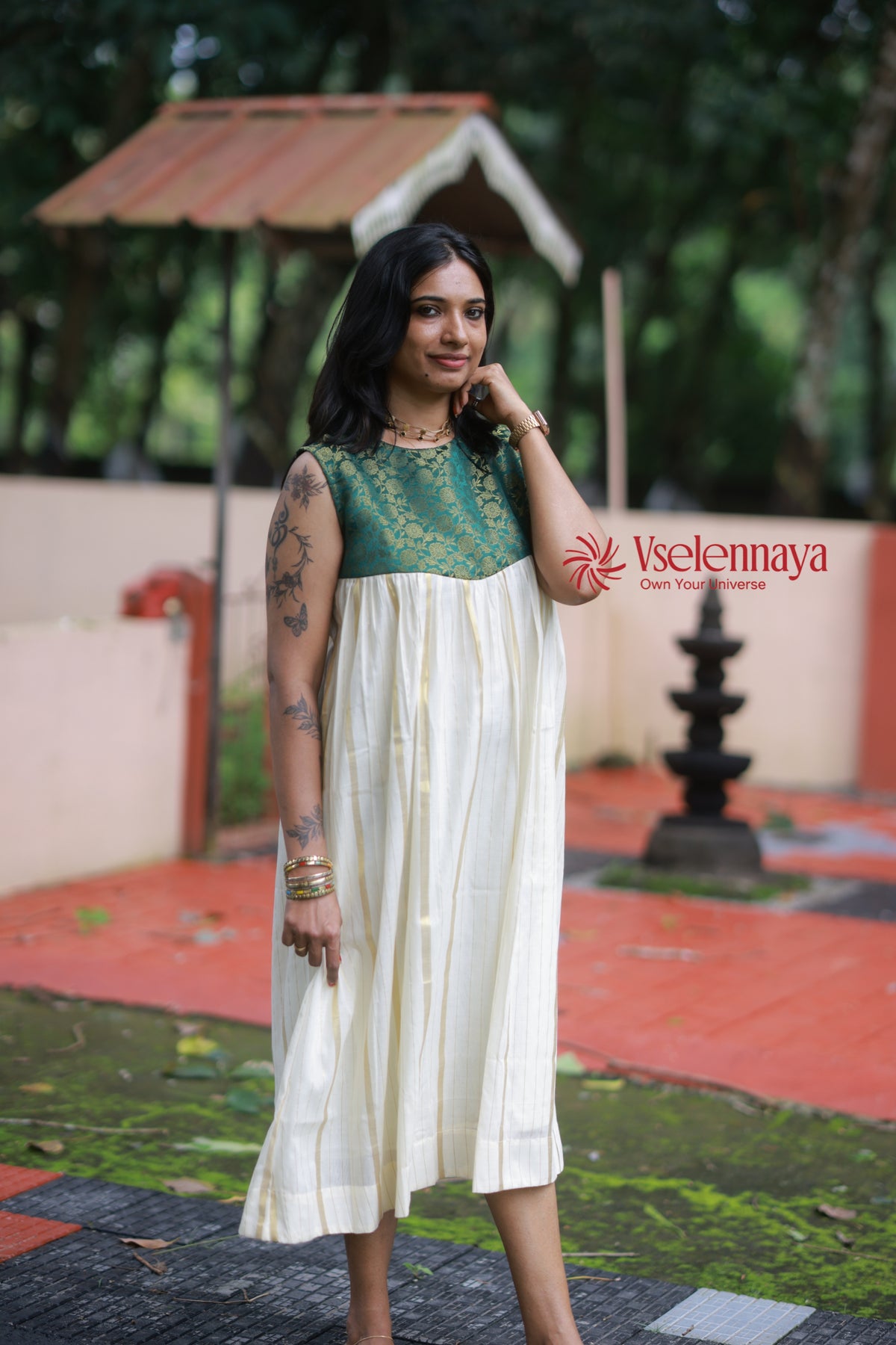 Hemam -Emerald Green with Off-White with Gold Vertical Zari stripes(Onam Special Limited Design)