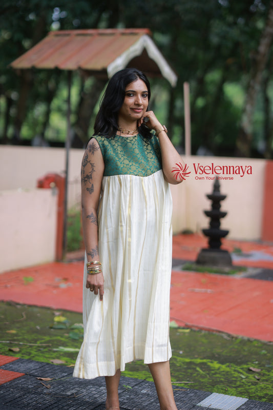 Hemam -Emerald Green with Off-White with Gold Vertical Zari stripes(Onam Special Limited Design)