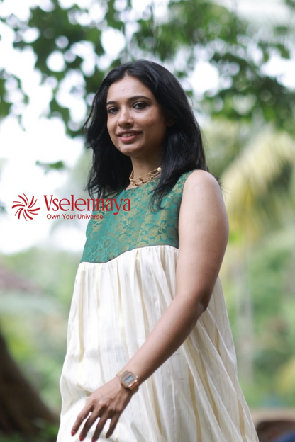 Hemam -Emerald Green with Off-White with Gold Vertical Zari stripes(Onam Special Limited Design)