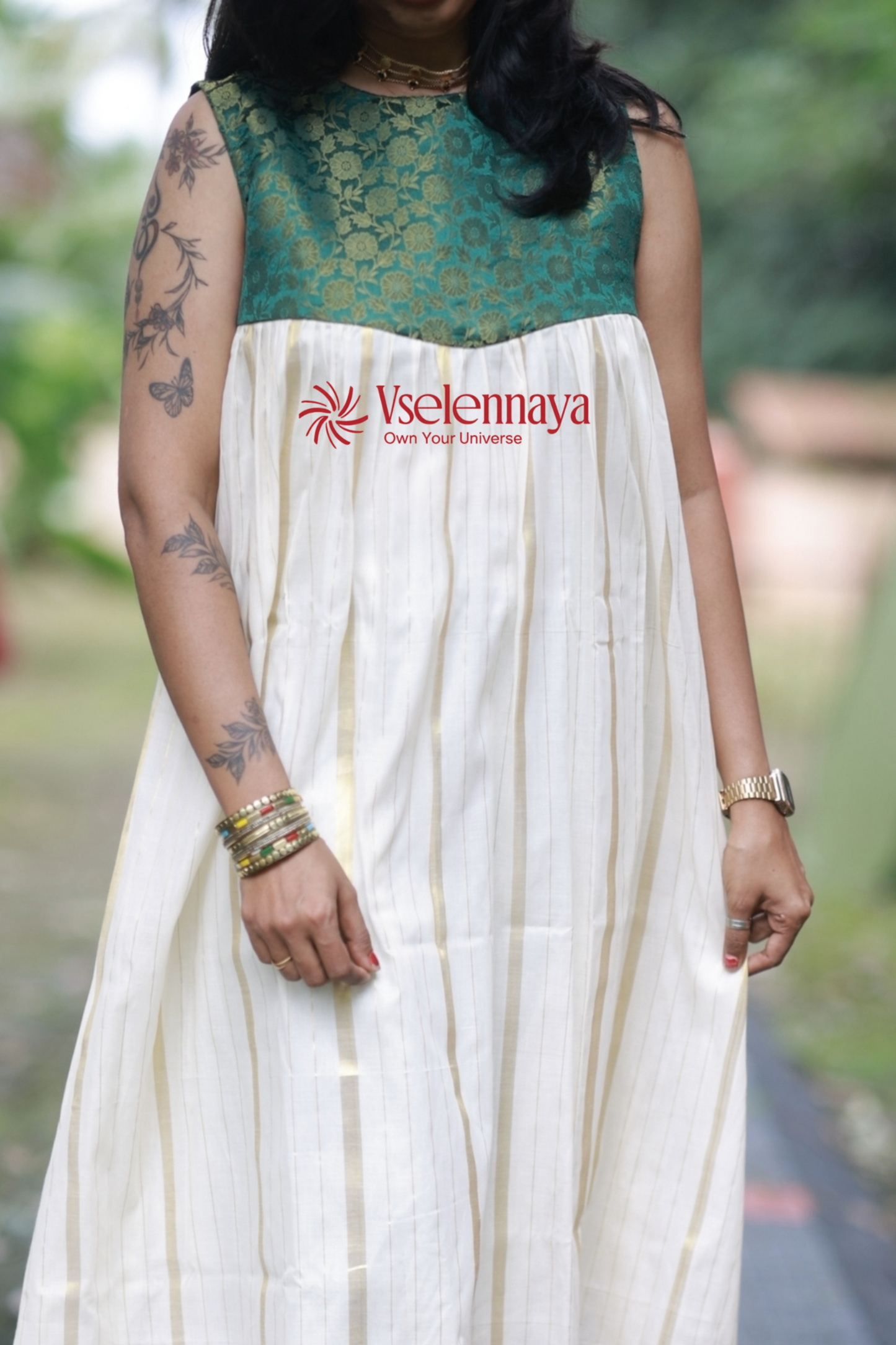 Hemam -Emerald Green with Off-White with Gold Vertical Zari stripes(Onam Special Limited Design)